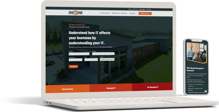 A laptop and smart phone displaying a responsive website for One2One IT services.