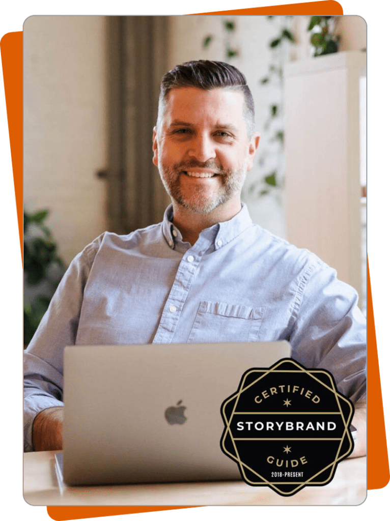 A man with a beard, Curt Stockwell, smiling at the camera, sitting behind a laptop with a "certified storybrand guide" badge displayed in the foreground.