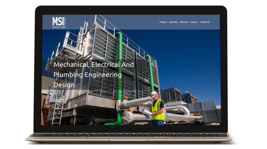 A laptop displays a website for MSI Engineers, featuring a photo of two workers in safety gear inspecting large mechanical and plumbing equipment outdoors. Text reads: "Mechanical, Electrical and Plumbing Engineering Services.